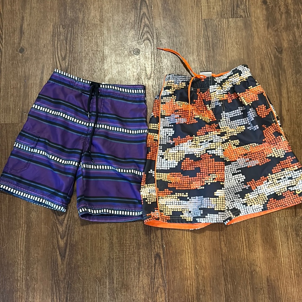 2 pairs Nike swim trunks size boys small- 7/8
